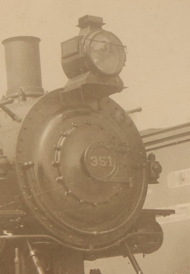 Lot 038 - Antique Boarded Occupational Photograph Of Locomotive 351 By American Locomotive Company, Maine Central Railroad, With Railroad Workers In Photo, Circa 1909 Partial Id On Verso, In Frame, Note Wear, 12-3/8" x 10-3/8"