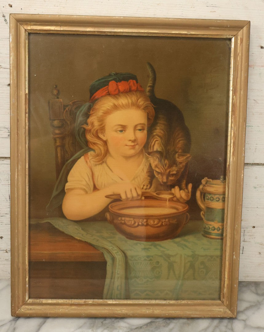 Lot 042 - Antique Chromolithograph Of Little Girl Sharing Soup With Kitten, In Gold Painted Frame, 13-5/8" x 17-5/8"