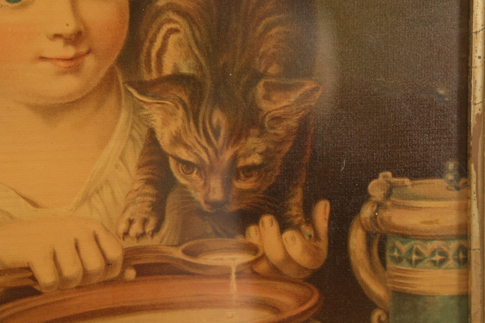 Lot 042 - Antique Chromolithograph Of Little Girl Sharing Soup With Kitten, In Gold Painted Frame, 13-5/8" x 17-5/8"