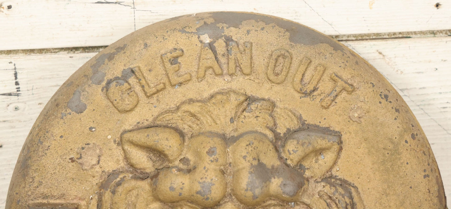 Lot 048 - Antique Cast Iron Stove Cleanout Door With Three Dimensional Lion Face, Gold Paint, 10" Diameter