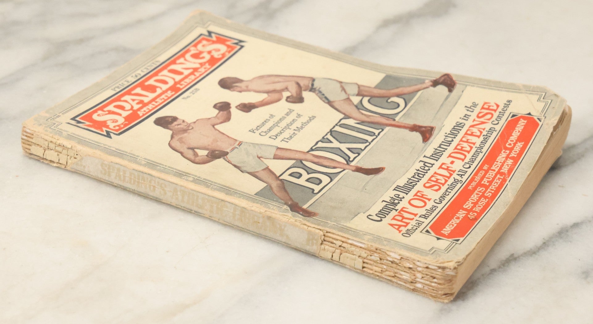 Lot 058 - "Spalding's Athletic Library No. 25B, Boxing, Complete Illustrated Instructions In The Art Of Self Defense", Vintage Boxing Booklet, With Many Photographs And Illustrations, Copyright 1926 By American Sports Publishing Co., Note Wear