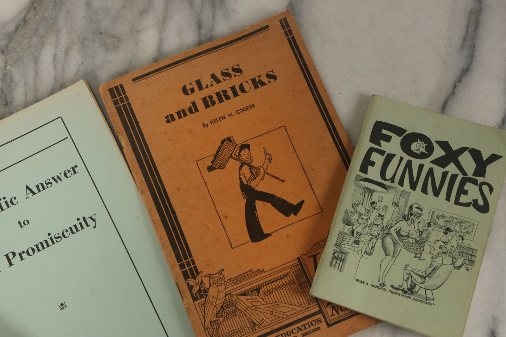 Lot 062 - Grouping Of Four Vintage Novelty Booklets Including "Sex Promiscuity", "Foxy Funnies", "Jokes Of Soldiers And Sailors" And "Glass And Bricks"