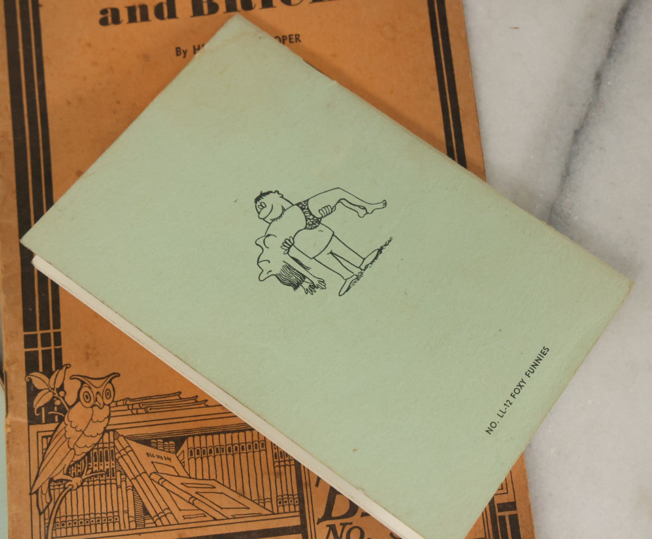 Lot 062 - Grouping Of Four Vintage Novelty Booklets Including "Sex Promiscuity", "Foxy Funnies", "Jokes Of Soldiers And Sailors" And "Glass And Bricks"