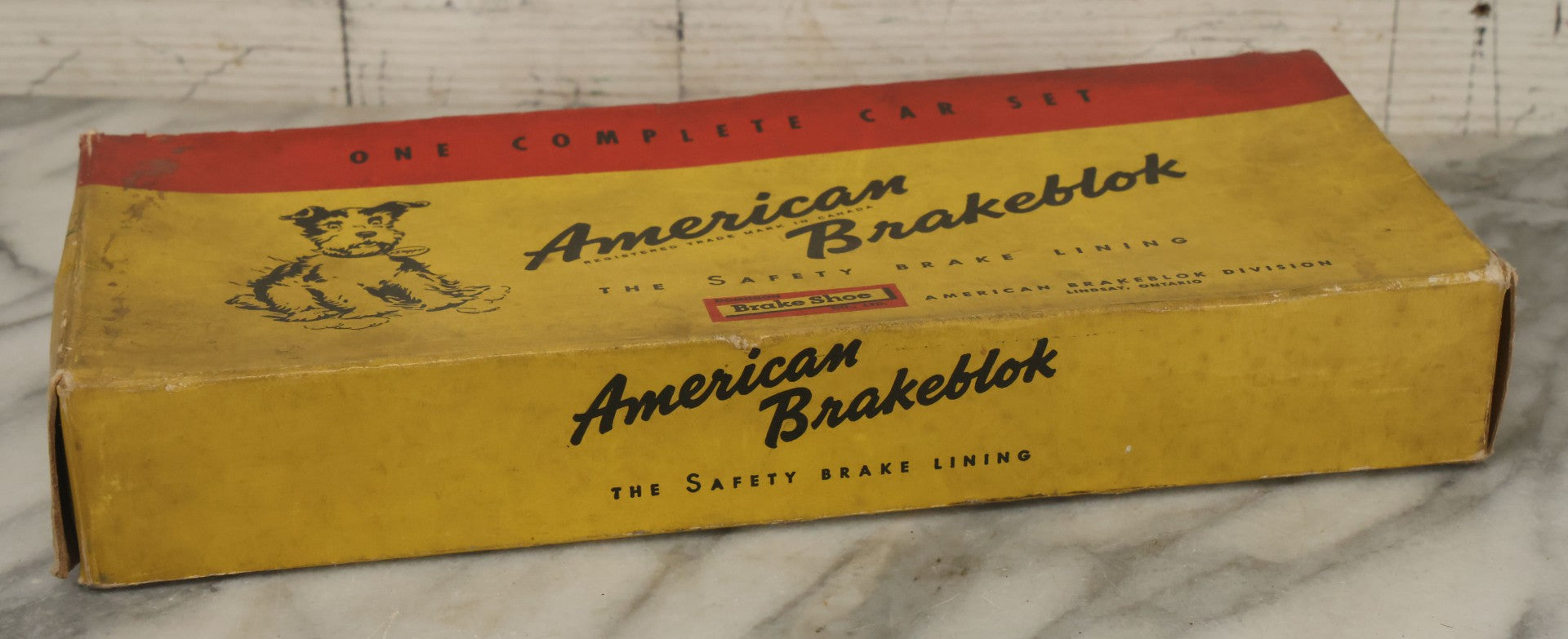 Lot 069 - Vintage American Brakeblok Safety Brake Lining Advertising Box With Stopper The Dog Mascot By Dominion Brake Shoe Company, Lindsay, Ontario, Canada, Circa 1946