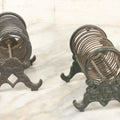 Lot 071 - Pair Of Vintage Cast Iron Spring Coil Letter Holders With Legs, Boots, One By K. Diamond, One By Mutat, No. 17 In Old Green Paint