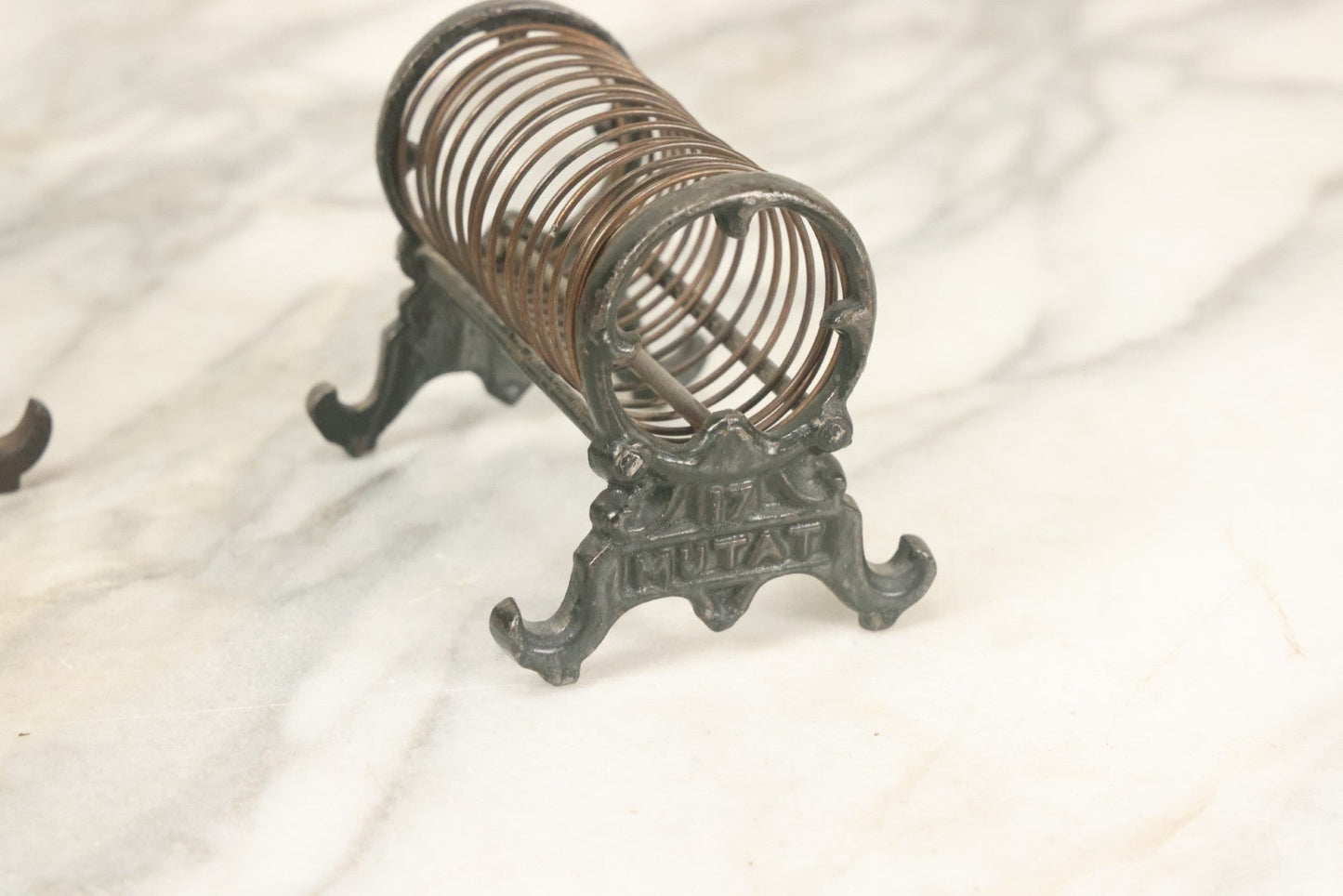 Lot 071 - Pair Of Vintage Cast Iron Spring Coil Letter Holders With Legs, Boots, One By K. Diamond, One By Mutat, No. 17 In Old Green Paint