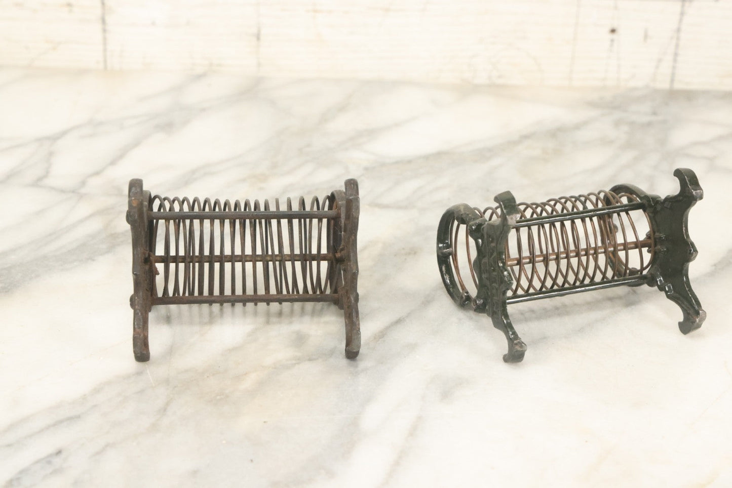 Lot 071 - Pair Of Vintage Cast Iron Spring Coil Letter Holders With Legs, Boots, One By K. Diamond, One By Mutat, No. 17 In Old Green Paint