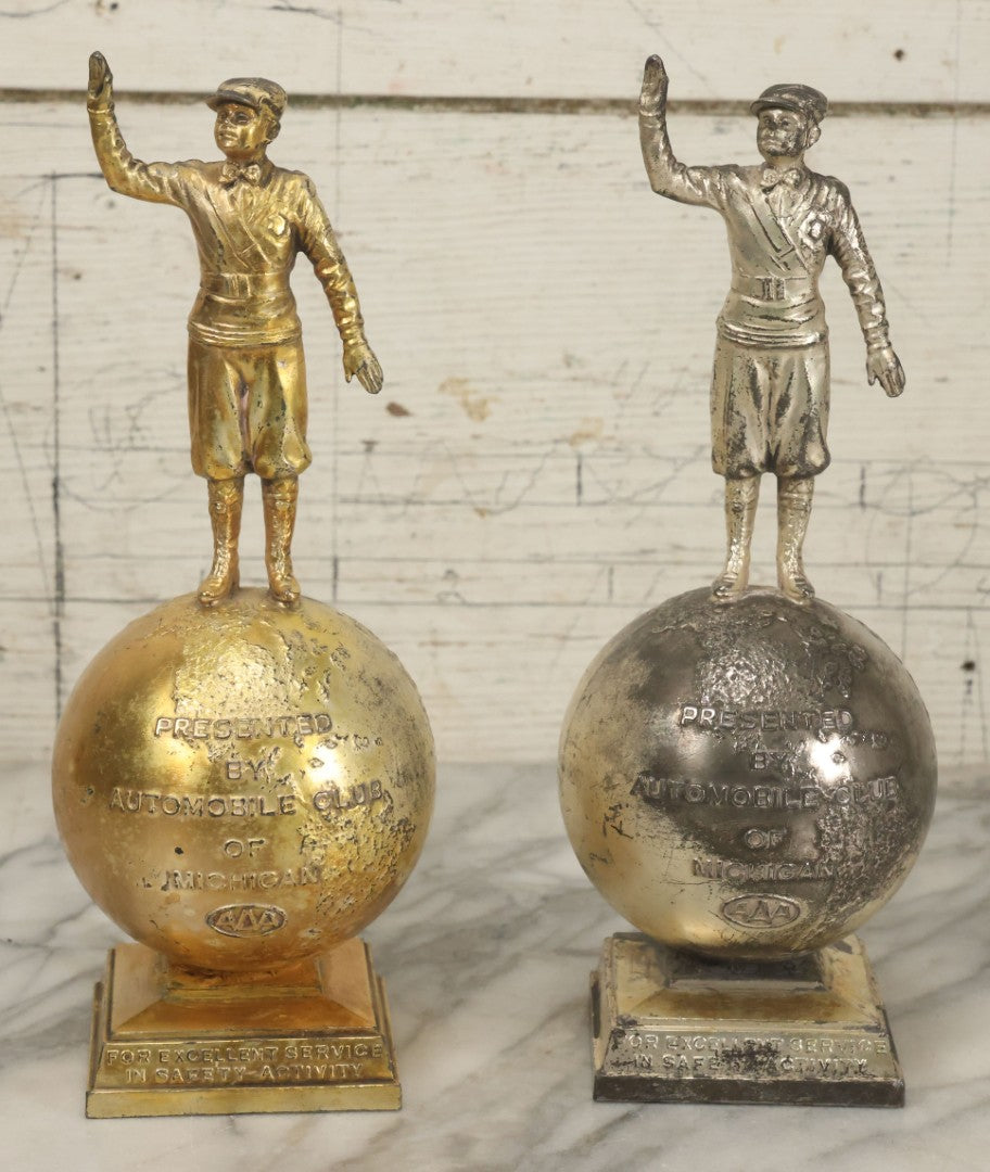 Lot 072 - Pair Of Vintage Automobile Club Michigan A.A.A. "Excellent Service And Safety Activity" Trophies, One In Gold Finish, One In Silver Finish, 10-1/4" Tall