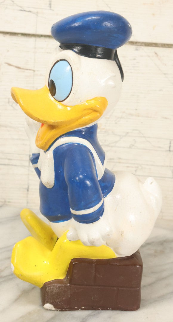 Lot 074 - Vintage Chalkware Donald Duck Novelty Bank, Copyright Walt Disney Productions, By Clay Pal Plastics Company, Note Various Chips, No Bottom Stopper, 11" Tall