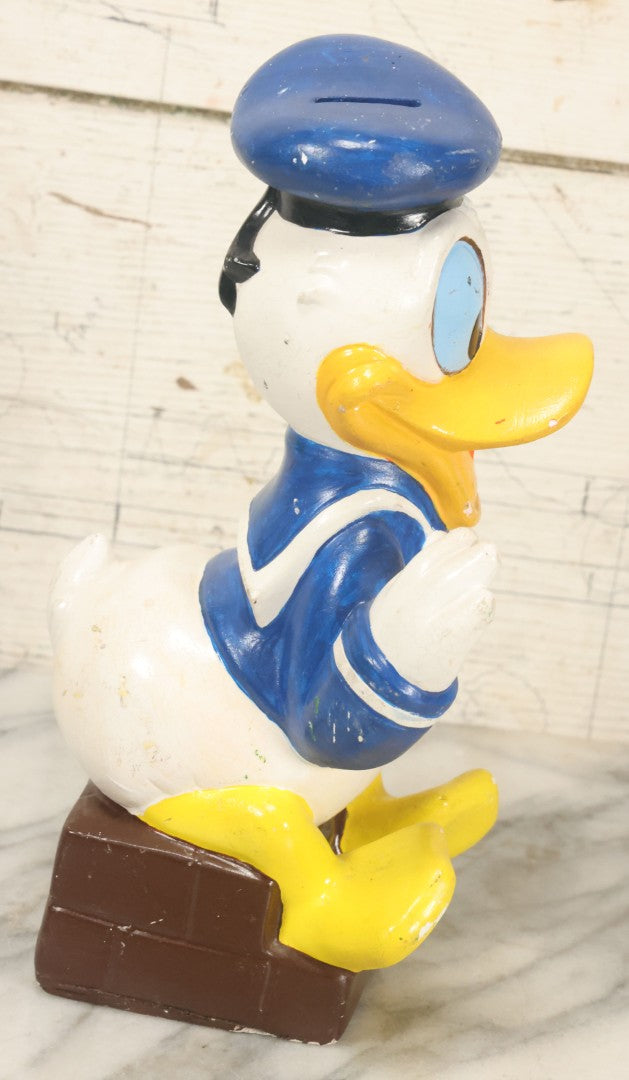 Lot 074 - Vintage Chalkware Donald Duck Novelty Bank, Copyright Walt Disney Productions, By Clay Pal Plastics Company, Note Various Chips, No Bottom Stopper, 11" Tall