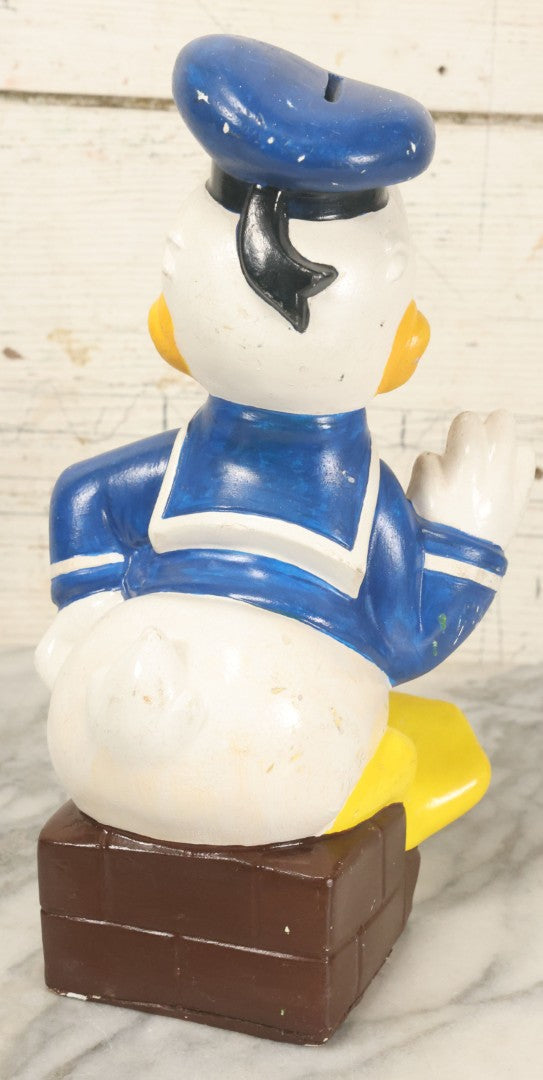 Lot 074 - Vintage Chalkware Donald Duck Novelty Bank, Copyright Walt Disney Productions, By Clay Pal Plastics Company, Note Various Chips, No Bottom Stopper, 11" Tall