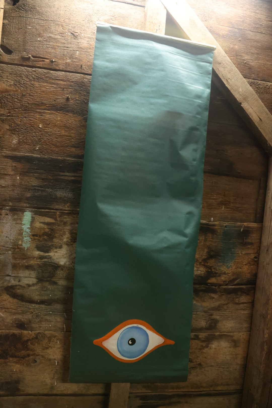 Lot 080 - Vintage Hand Painted Eyeball Art On Green Vinyl Window Blind,  26" Across x 73" Long Unrolled Including Hangers