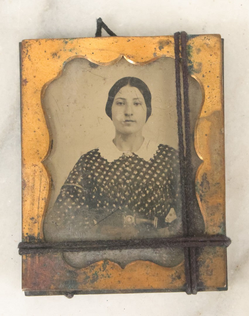 Lot 102 - Antique 1/9th Plate Ambrotype Photograph Of Young Woman In Spotted Dress With White Collar, Uncased And Tied With String, As Found