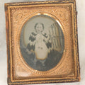 Lot 104 - Antique 1/6th Plate Tintype Photograph Of Toddler With Fur Cape, Tinted Lips And Cheeks, Jewelry, In Half Leatherette Case With Crane Motif