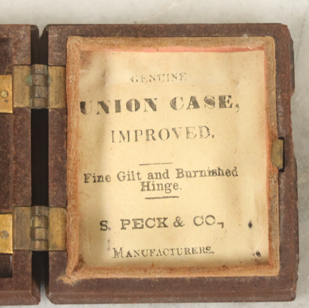 Lot 105 - Antique 1/16th Plate Tintype Photograph Of Young Woman With Short Hair And White Collar, In Thermoplastic Union Case, By S. Peck & Co. Manufacturers, Note No Interior Case Pillow