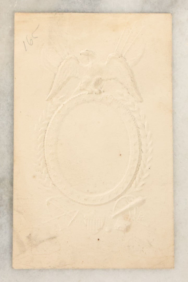 Lot 109 - Single Antique Carte De Visite C.D.V. Photograph Of Civil War Era Soldier, Applied To Embossed Paper, Patriotic Frame With Eagle, Cannons, Etc.