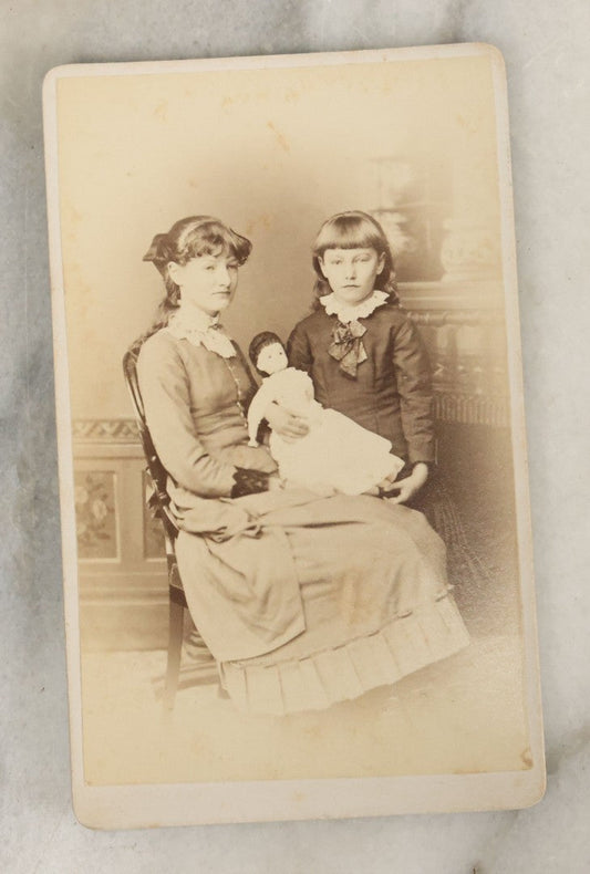 Lot 111 - Single Antique Carte De Visite C.D.V. Photograph Of Two Young Girls Holding A Doll, One Seated One Standing, L. Stickney, Photographer, Morris, New York