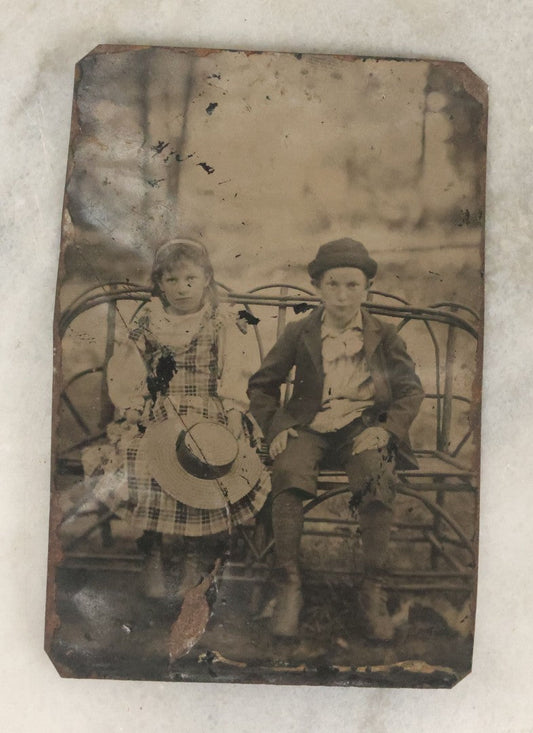 Lot 118 - Single Antique Tintype Photograph Of Young Boy And Young Girl, Pictured On Adirondack Branch Bench Outdoors