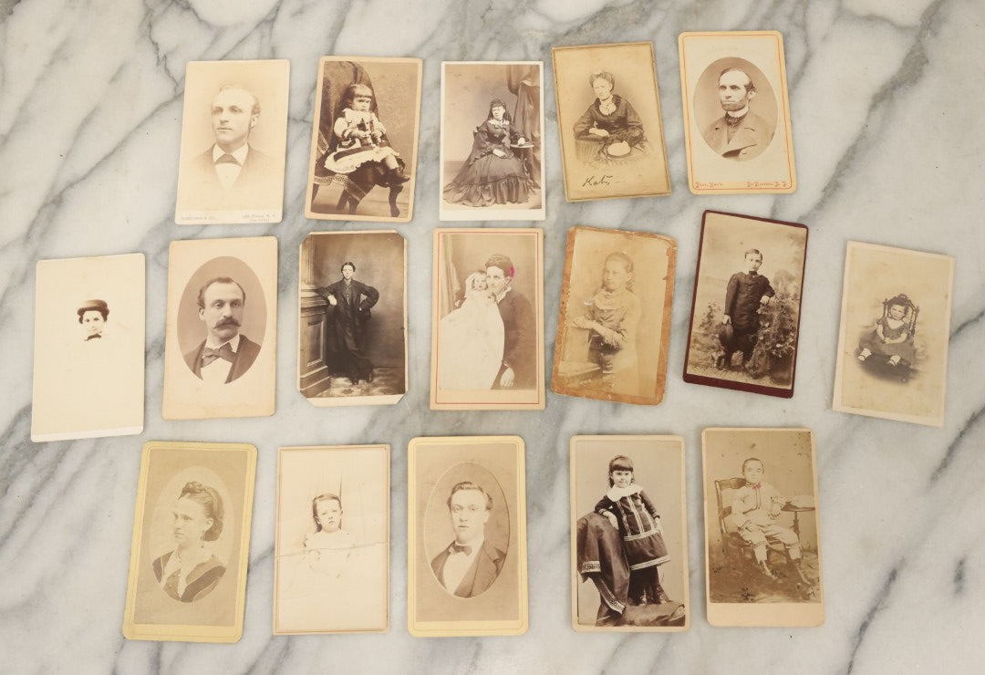 Lot 120 - Grouping Of 17 Antique Carte De Visite C.D.V. Photographs Of Men, Women And Children, Including Mother With Tiny Baby And Boy With Pink Tinted Bowtie