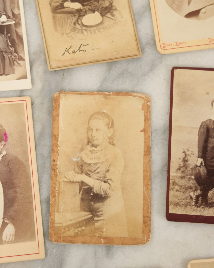 Lot 120 - Grouping Of 17 Antique Carte De Visite C.D.V. Photographs Of Men, Women And Children, Including Mother With Tiny Baby And Boy With Pink Tinted Bowtie