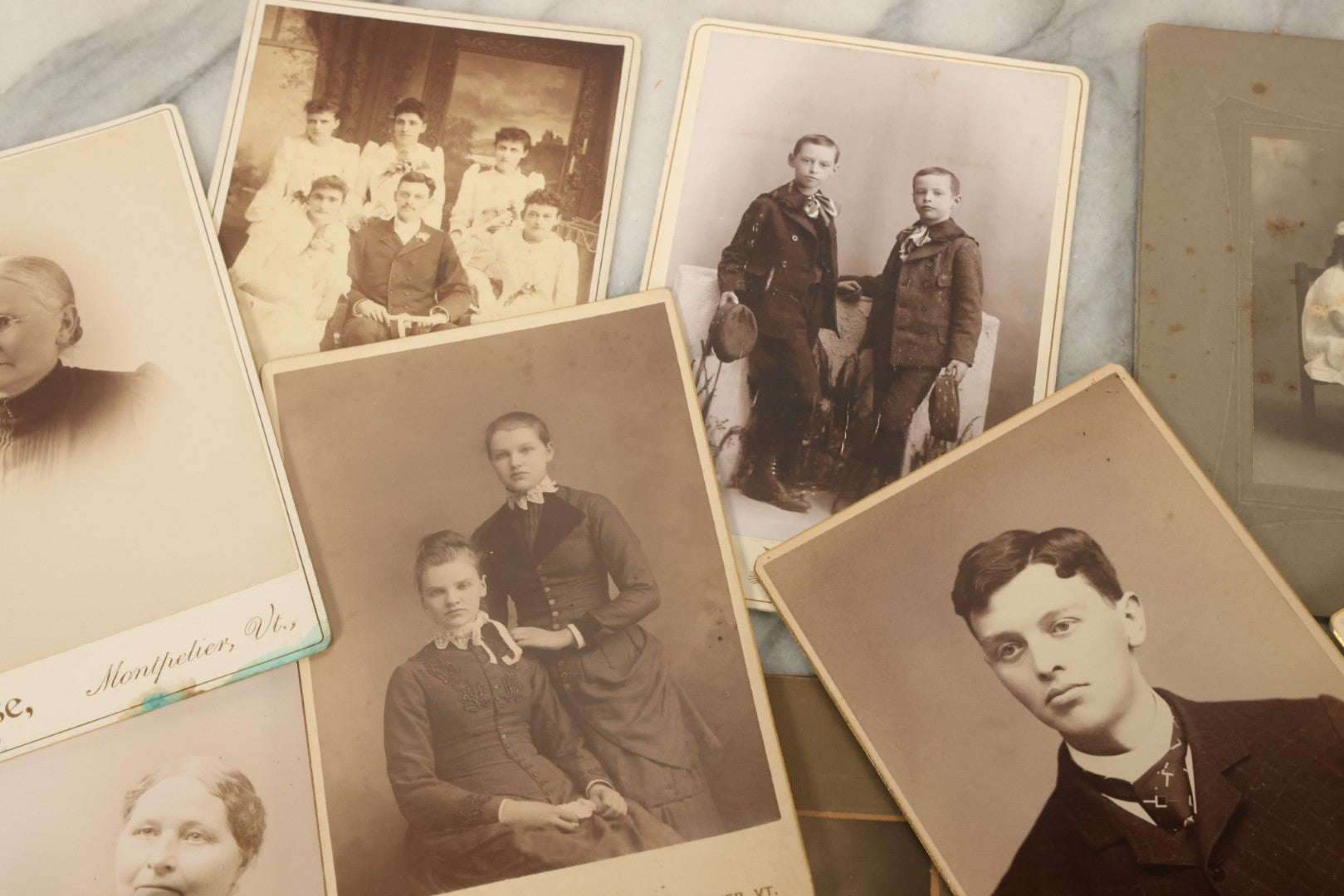Lot 121 - Grouping Of 23 Antique Cabinet Card And Boarded Photographs Of Men, Women And Children, Including Class Of Graduates From Waterbury, Vermont