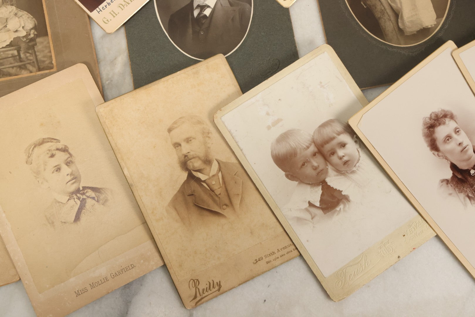Lot 121 - Grouping Of 23 Antique Cabinet Card And Boarded Photographs Of Men, Women And Children, Including Class Of Graduates From Waterbury, Vermont