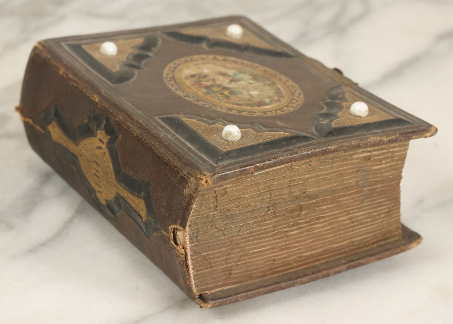 Lot 123 - Antique Cabinet Card And Tintype Family Photo Album, 3 C.D.V. Photos, 10 Tintypes, 2 Illustrated Album Filler Cards, Including Tintype Of Scowling Old Man And Illustrated Card Of Civil War Commander Foot, Cover With Harlequin And Fairy Motif