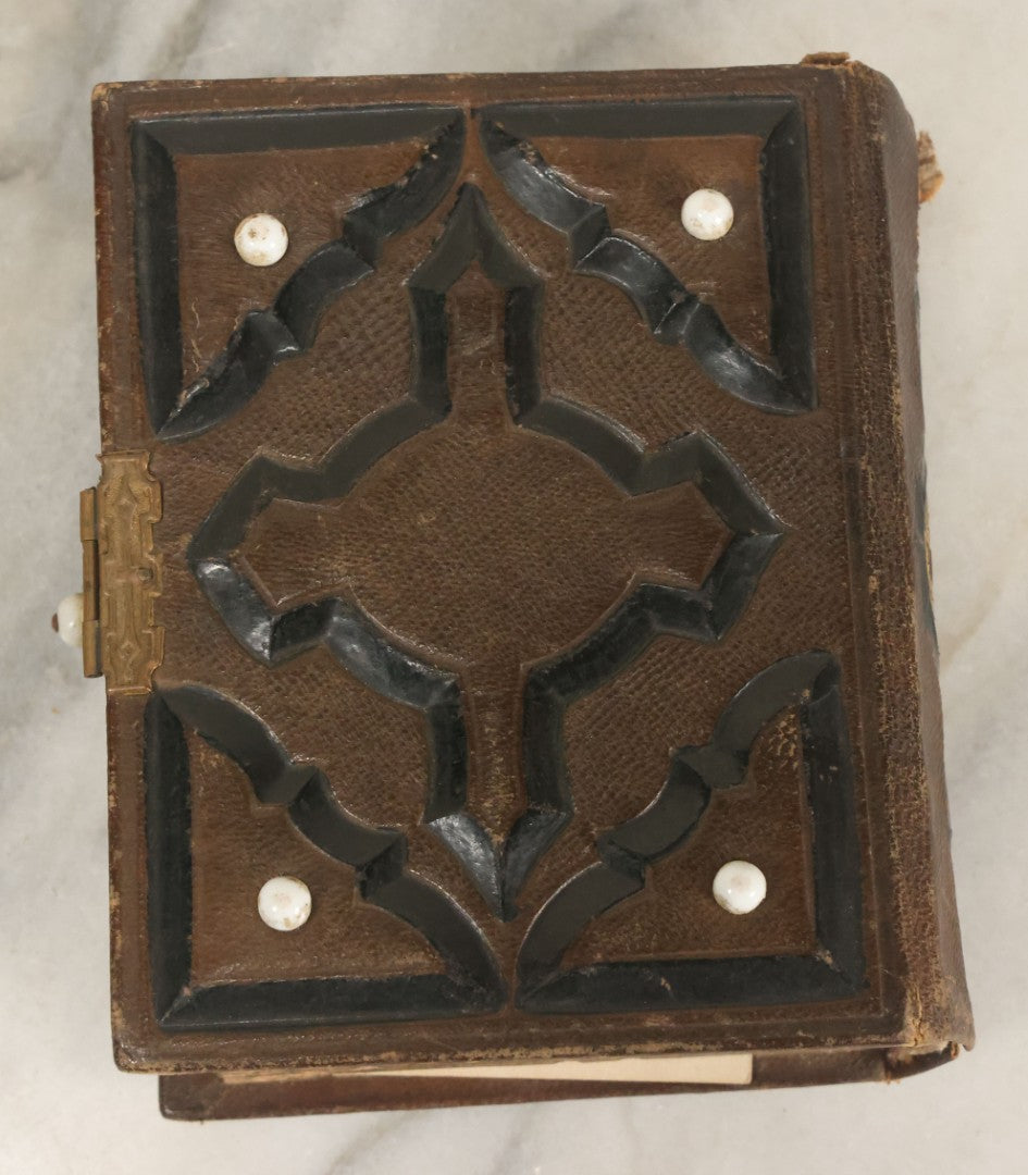 Lot 123 - Antique Cabinet Card And Tintype Family Photo Album, 3 C.D.V. Photos, 10 Tintypes, 2 Illustrated Album Filler Cards, Including Tintype Of Scowling Old Man And Illustrated Card Of Civil War Commander Foot, Cover With Harlequin And Fairy Motif