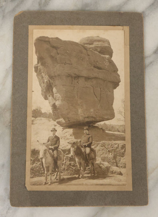 Lot 133 - Antique Boarded Photograph Of Two Men On Donkeys Posing In Front Of Large Balancing Rock Formation