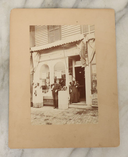 Lot 134 - Antique Occupational Boarded Photograph Of Man And Woman Standing Outside Boot And Shoe Store, The Commercial Photographing Company, Photographers, Boston, Massachusetts