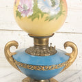Lot 003 - Antique Kerosene Oil Lamp With Painted Blue Tin Font, Dove Head Motif, And Hand Painted Globe With Floral Motif By Pittsburgh Lamp And Brass, Made In America, Note Cracked And Repaired Section Of Globe, 19" High