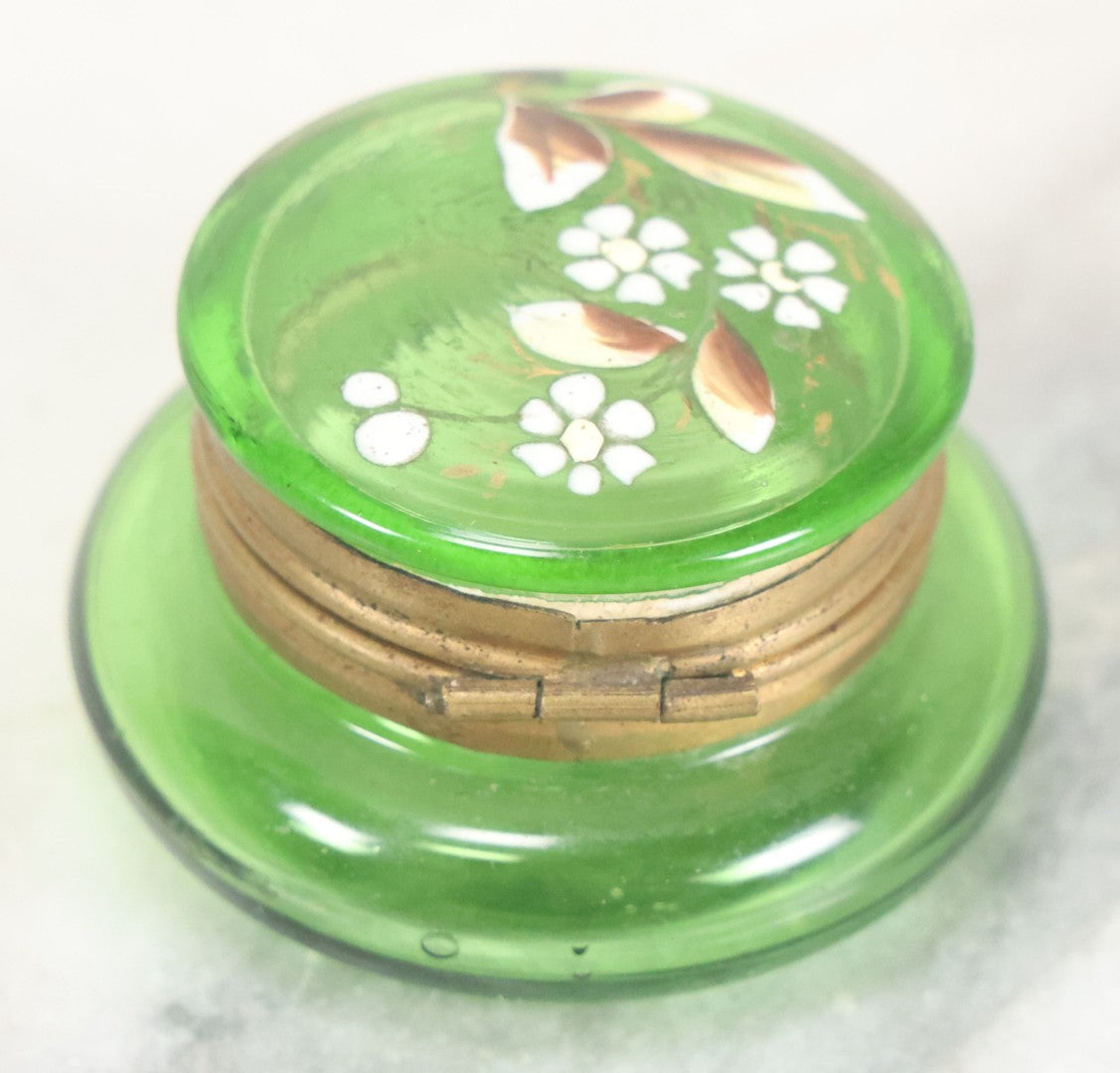 Lot 107 - Vintage Green Glass Pill Box With Hand Painted Flower Details And Brass Latch (Does Not Glow Under Blacklight), 2" Diameter