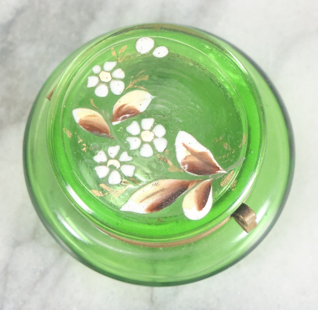 Lot 107 - Vintage Green Glass Pill Box With Hand Painted Flower Details And Brass Latch (Does Not Glow Under Blacklight), 2" Diameter