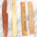 Lot 121 - Grouping Of Vintage Desk Tools Including Two Advertising Rulers, Carved Fish Letter Opener, And Celluloid Pronghorn Page Turner