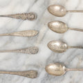 Lot 122 - Grouping Of 8 Antique Souvenir Spoons Relating To Ships And Leaders Of The Spanish American War Including The U.S. Battleship Maine, The Flagship New York, And Others, Manufactured By George E. Homer, Boston