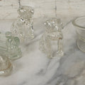 Lot 157 - Grouping Of Five Vintage Clear Glass Candy Containers Including Train, Firetruck, Two Dogs, And Military Cap Hat