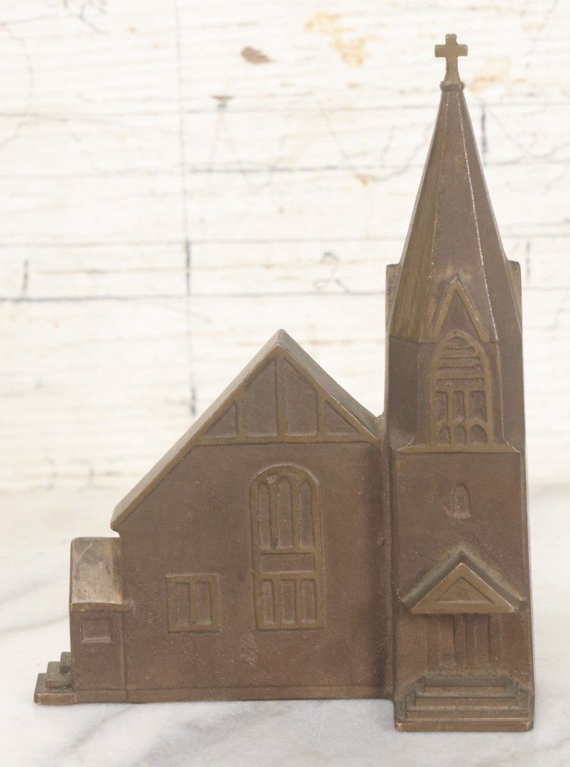 Lot 013 - Antique Single Cast Metal Church Bookend Figurine With Steeple With Cross