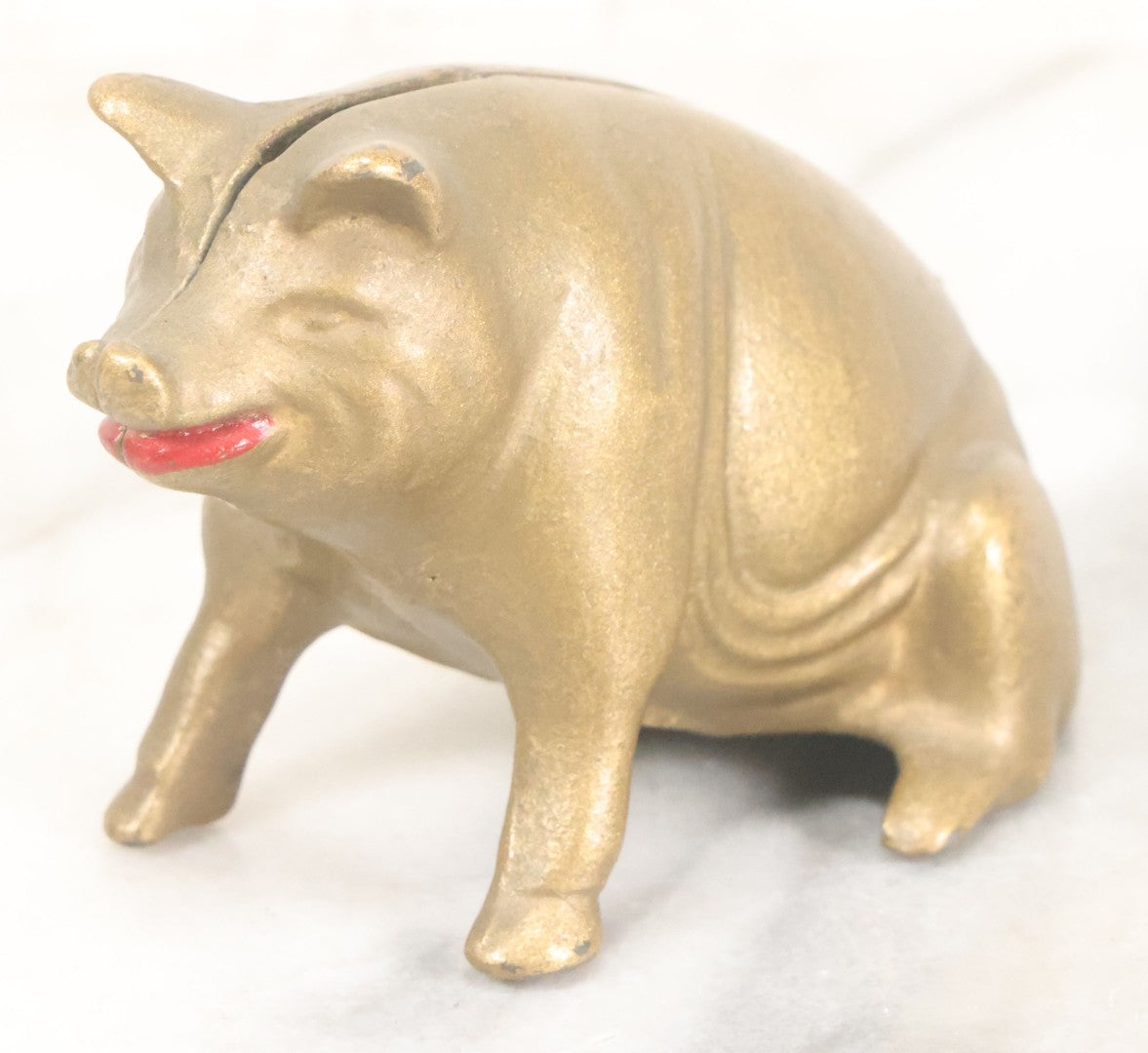 Lot 016 - Vintage Cast Iron Squatting Pig Piggy Still Bank In Gold Paint With Red Lips