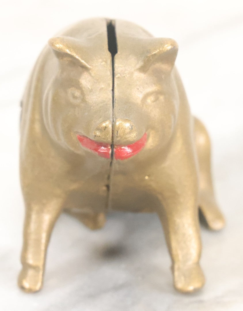 Lot 016 - Vintage Cast Iron Squatting Pig Piggy Still Bank In Gold Paint With Red Lips