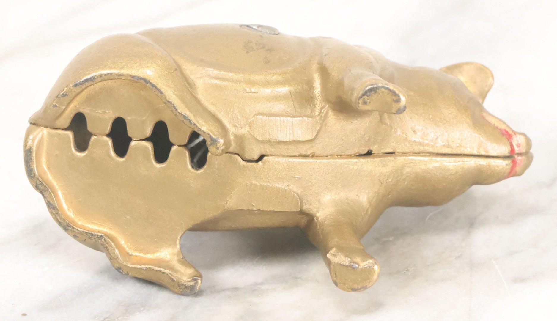Lot 016 - Vintage Cast Iron Squatting Pig Piggy Still Bank In Gold Paint With Red Lips