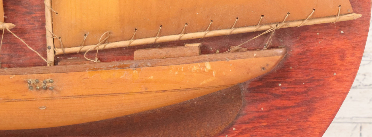 Lot 020 - Vintage Folk Art Wooden Half Hull Boat Model Plaque Wall Hanger With Wooden Sails, Note Torn Strings, Internal Dust, 14-1/2" x 16-1/2"