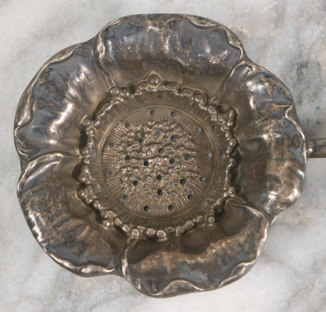 Lot 028 - Antique Sterling Silver Anemone Flower Tea Strainer With Octagonal Black Lacquered Wooden Handle, Marked "Sterling-A"
