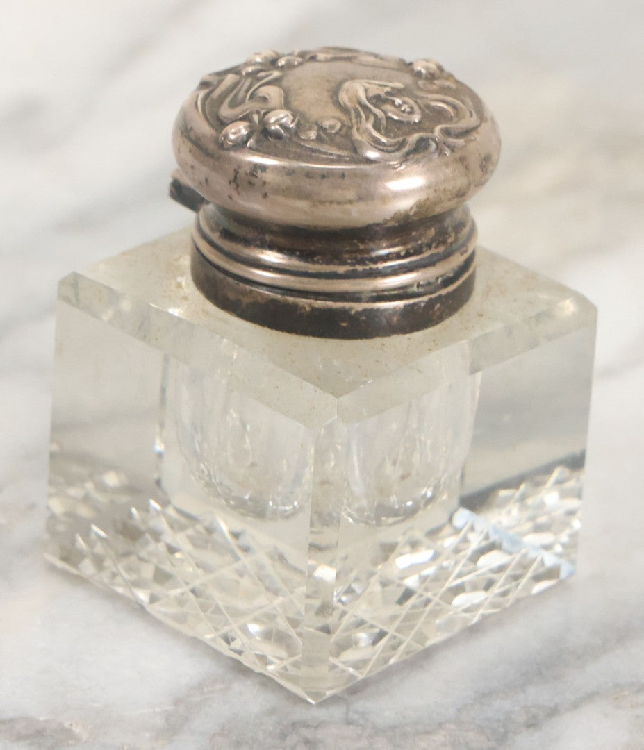 Lot 029 - Antique Cut Glass Inkwell With Art Nouveau Sterling Silver Lid With Woman Head And Lily Motif, Marked Sterling, With Hallmark, No. 1560