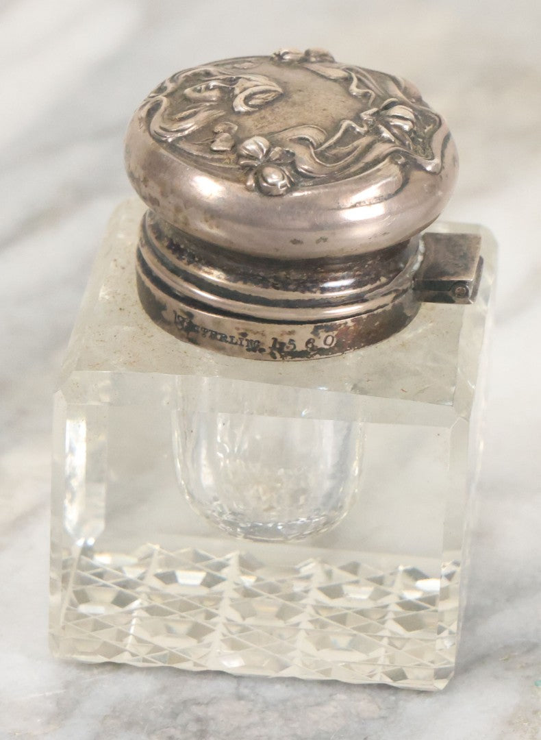 Lot 029 - Antique Cut Glass Inkwell With Art Nouveau Sterling Silver Lid With Woman Head And Lily Motif, Marked Sterling, With Hallmark, No. 1560