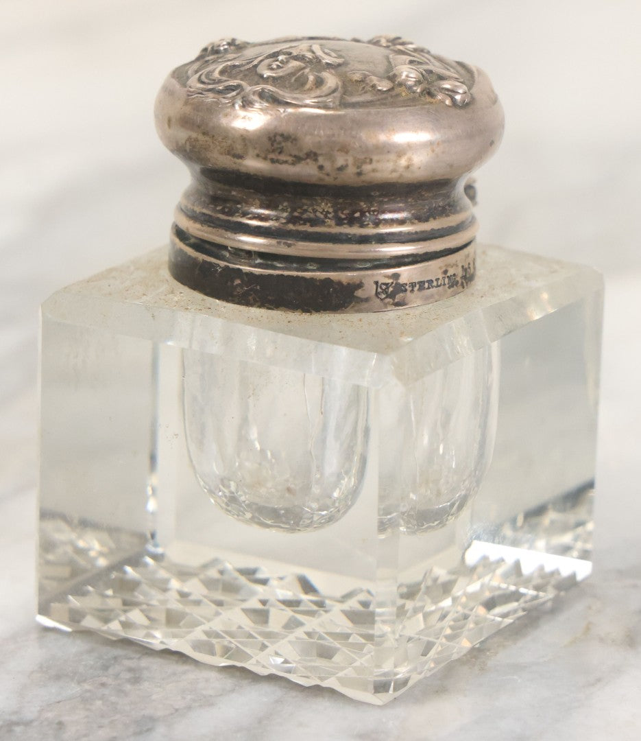 Lot 029 - Antique Cut Glass Inkwell With Art Nouveau Sterling Silver Lid With Woman Head And Lily Motif, Marked Sterling, With Hallmark, No. 1560