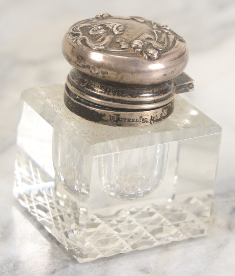 Lot 029 - Antique Cut Glass Inkwell With Art Nouveau Sterling Silver Lid With Woman Head And Lily Motif, Marked Sterling, With Hallmark, No. 1560