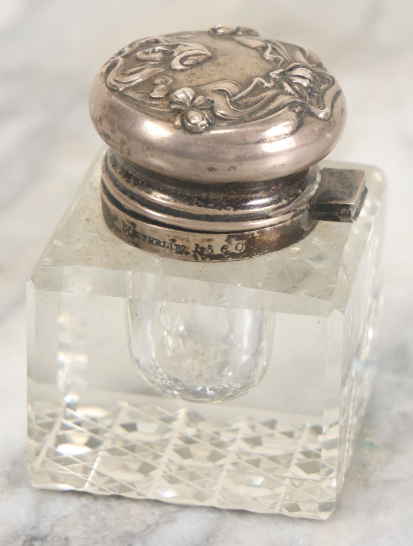 Lot 029 - Antique Cut Glass Inkwell With Art Nouveau Sterling Silver Lid With Woman Head And Lily Motif, Marked Sterling, With Hallmark, No. 1560