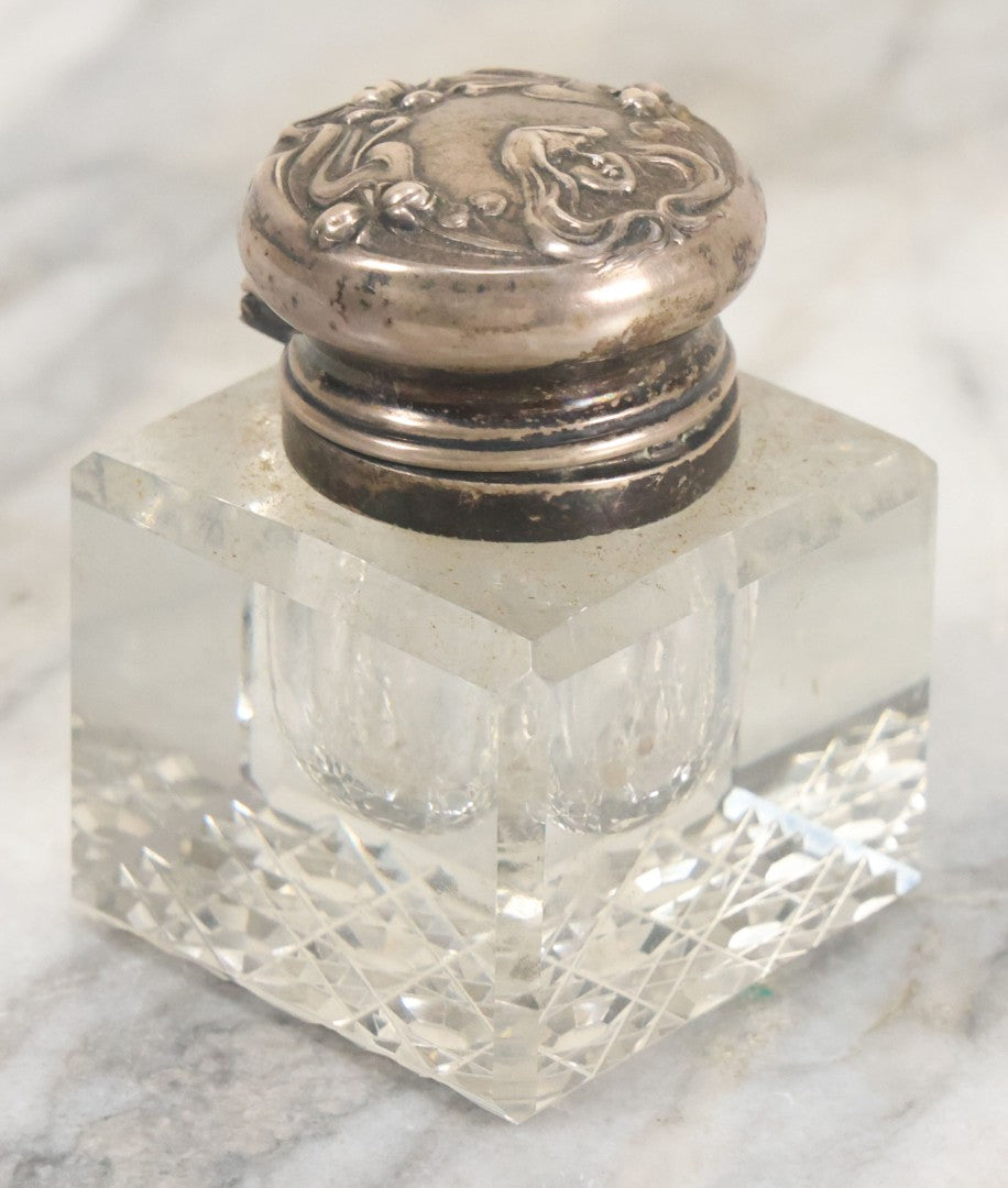 Lot 029 - Antique Cut Glass Inkwell With Art Nouveau Sterling Silver Lid With Woman Head And Lily Motif, Marked Sterling, With Hallmark, No. 1560