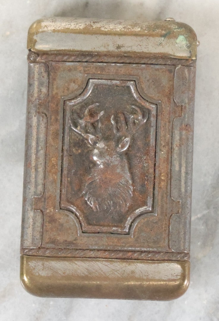 Lot 031 - Antique Tin Hunter's Match Safe With Elk, Hunting Dog, And Fishing Hook Motif, Circa 1920s, Note Minor Rust