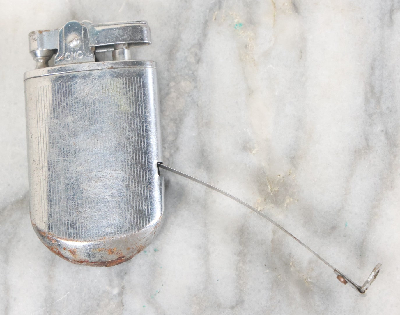 Lot 033 - Vintage Novelty Lighter And 36 Inch Tape Measure Combo, C.M.C., New Flint, Working Condition